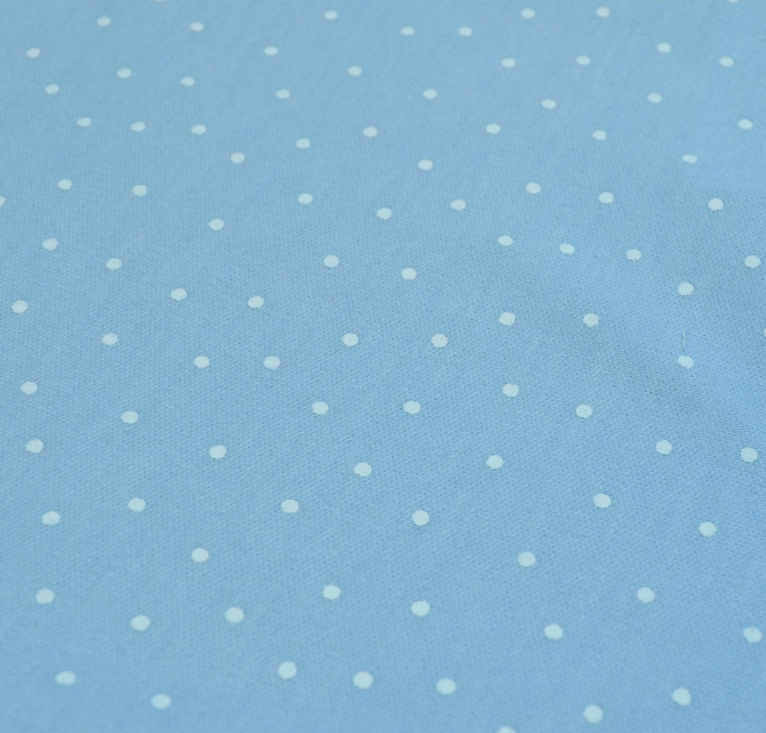 Lollipop Dreams' Mommy’s Mini Bubble Trio features light blue fabric adorned with evenly spaced small white polka dots.
