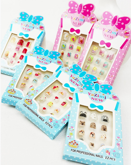 Six colorful packs of love & repeat’s Lovely Press On Kids Nails Set are displayed, each with cute designs like animals and cartoon faces, and decorated pink and blue bows on the packaging.