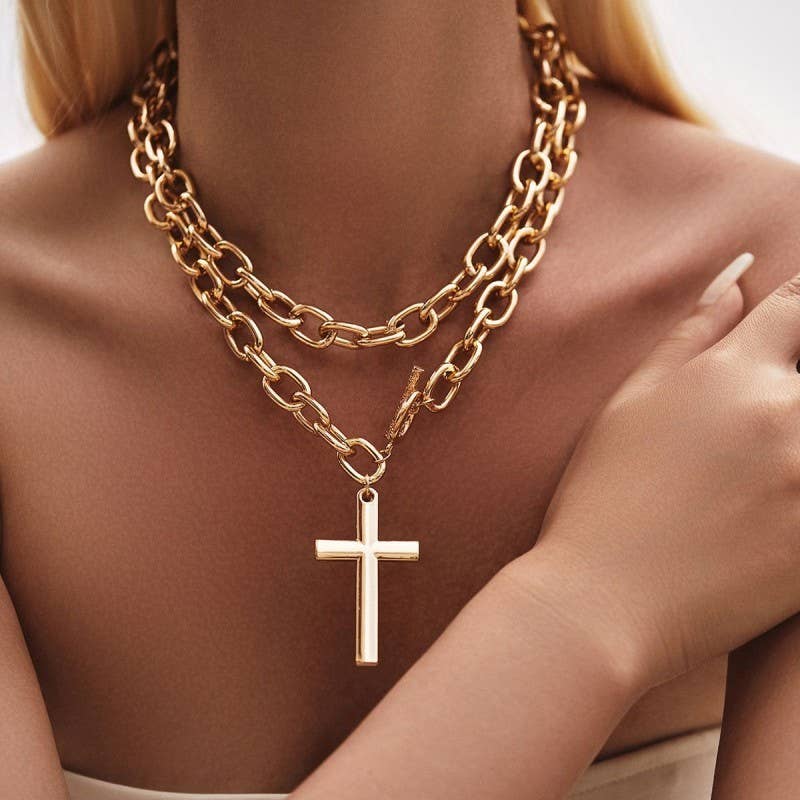 A JOSSLYN by wall to wall Cross Chunky Chain Necklace featuring a gold-toned double-layered chain with a simple cross pendant.