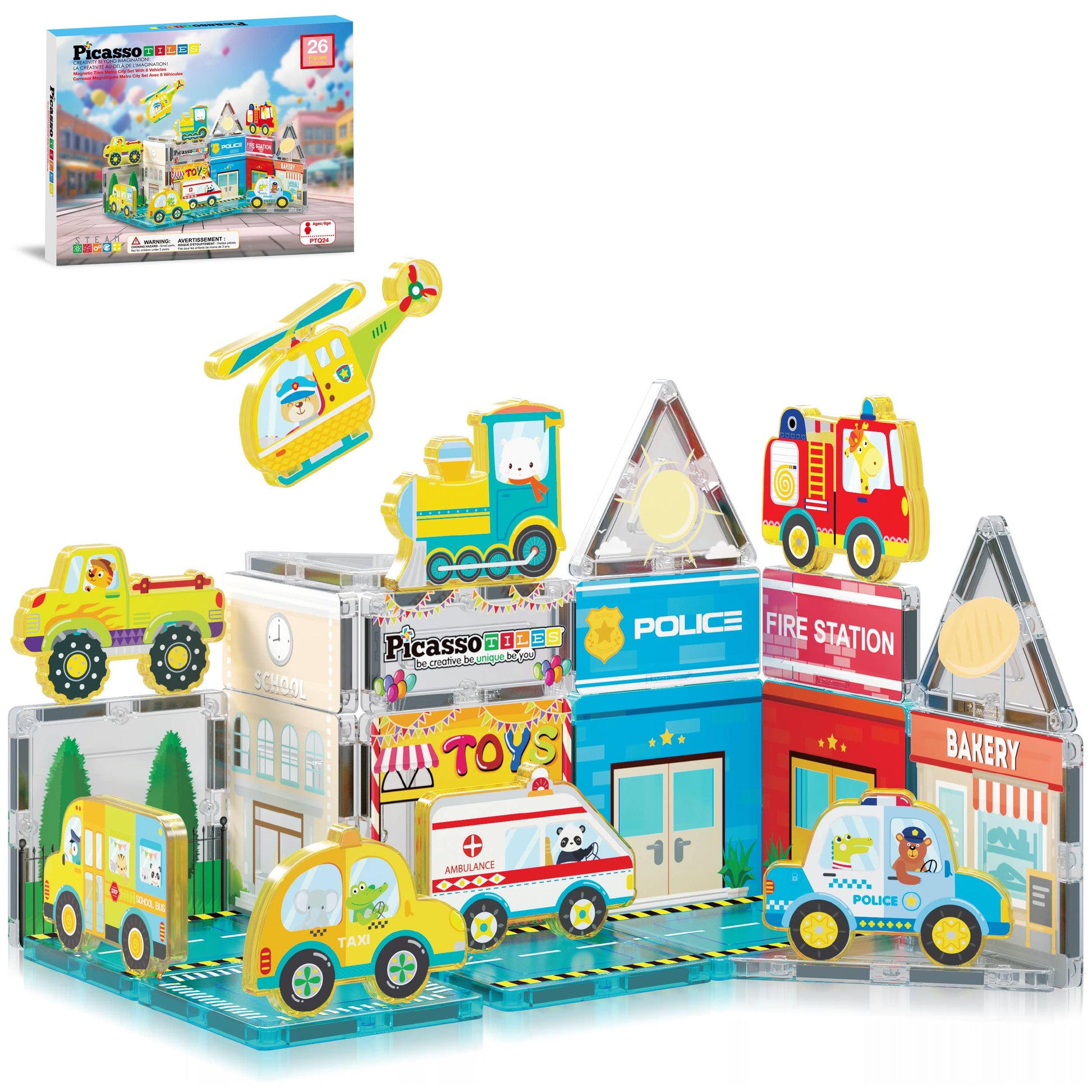 The PicassoTiles 26pc City Theme Magnetic Tile Building Set by PicassoTiles creates a vibrant town with a police station, fire station, bakery, school bus, vehicles, and more, displayed next to the product's box.