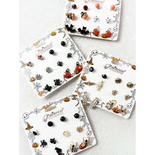 Cute Halloween Theme Earring Set by Love and Repeat displayed on four cards, featuring pumpkin, ghost, bat, skeleton, spider, and witch hat studs.