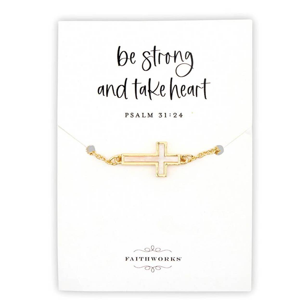 Mother of Pearl Cross Filled Display bracelet on a white card featuring the words “be strong and take heart” and “Psalm 31:24” above, with the Faithworks by Creative Brands logo below. A simple and elegant religious-themed jewelry display.