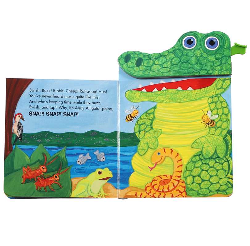 The "Andy Alligator Book" by Simon & Schuster is an illustrated children's book featuring a pop-out green alligator head with bees, a snake, a frog, birds, and insects near a blue river. The text describes the sounds these animals make.