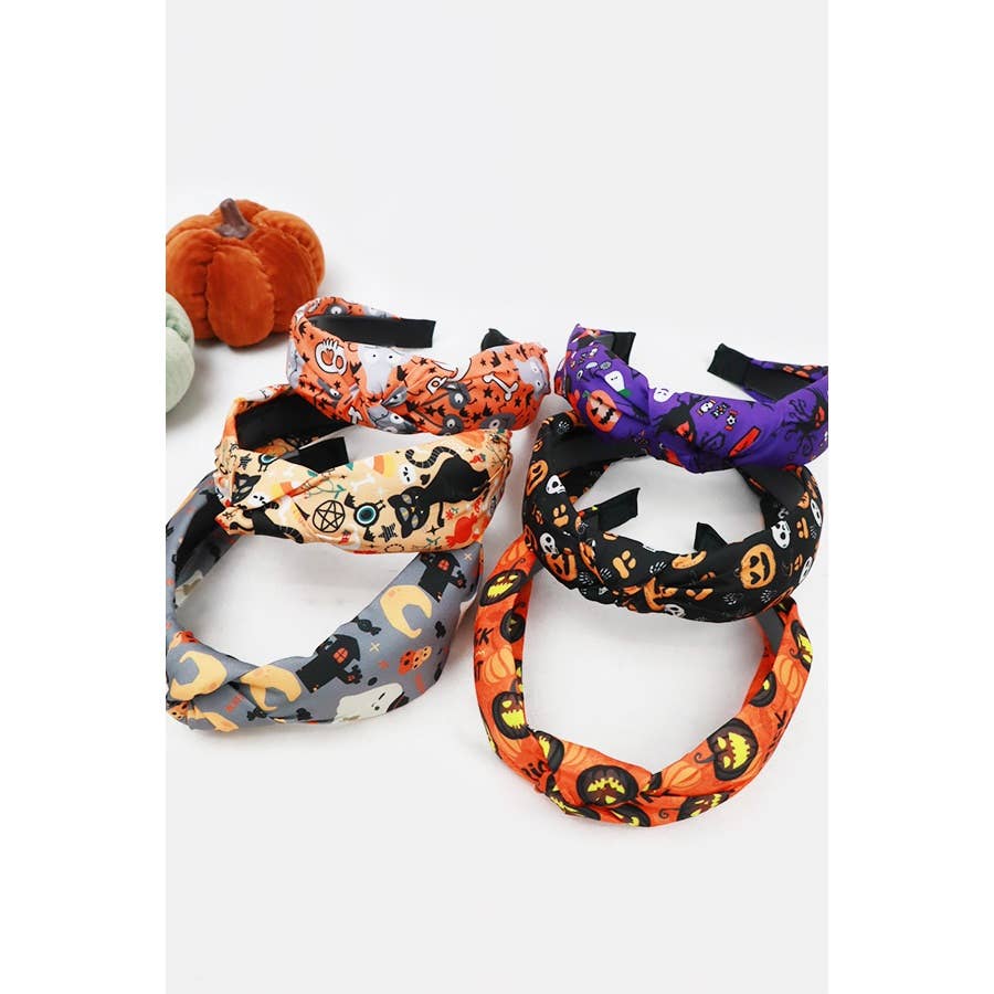 Five Love and Repeat Halloween Theme Headband knotted fabric headbands featuring various patterns, including pumpkins, ghosts, cats, and skulls.