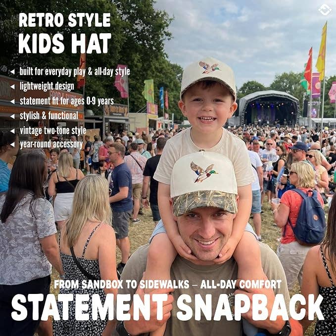 A father carries his young son on his shoulders at an outdoor festival, both wearing matching Funky Junque Mallard Duck Vintage Hat baseball caps, surrounded by text promoting the hats.