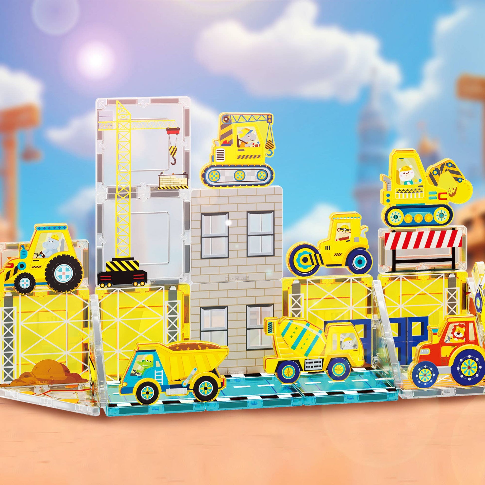 The PicassoTiles 26 Piece Magnetic Building Set Playset by PicassoTiles features colorful construction vehicles, workers, cranes, and building structures on a playset with traffic barriers, set against a blurred outdoor backdrop.